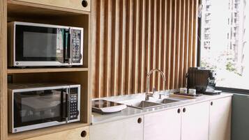 Fridge, microwave, stovetop, coffee/tea maker