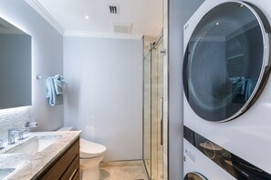 Shower, hair dryer, bidet, towels