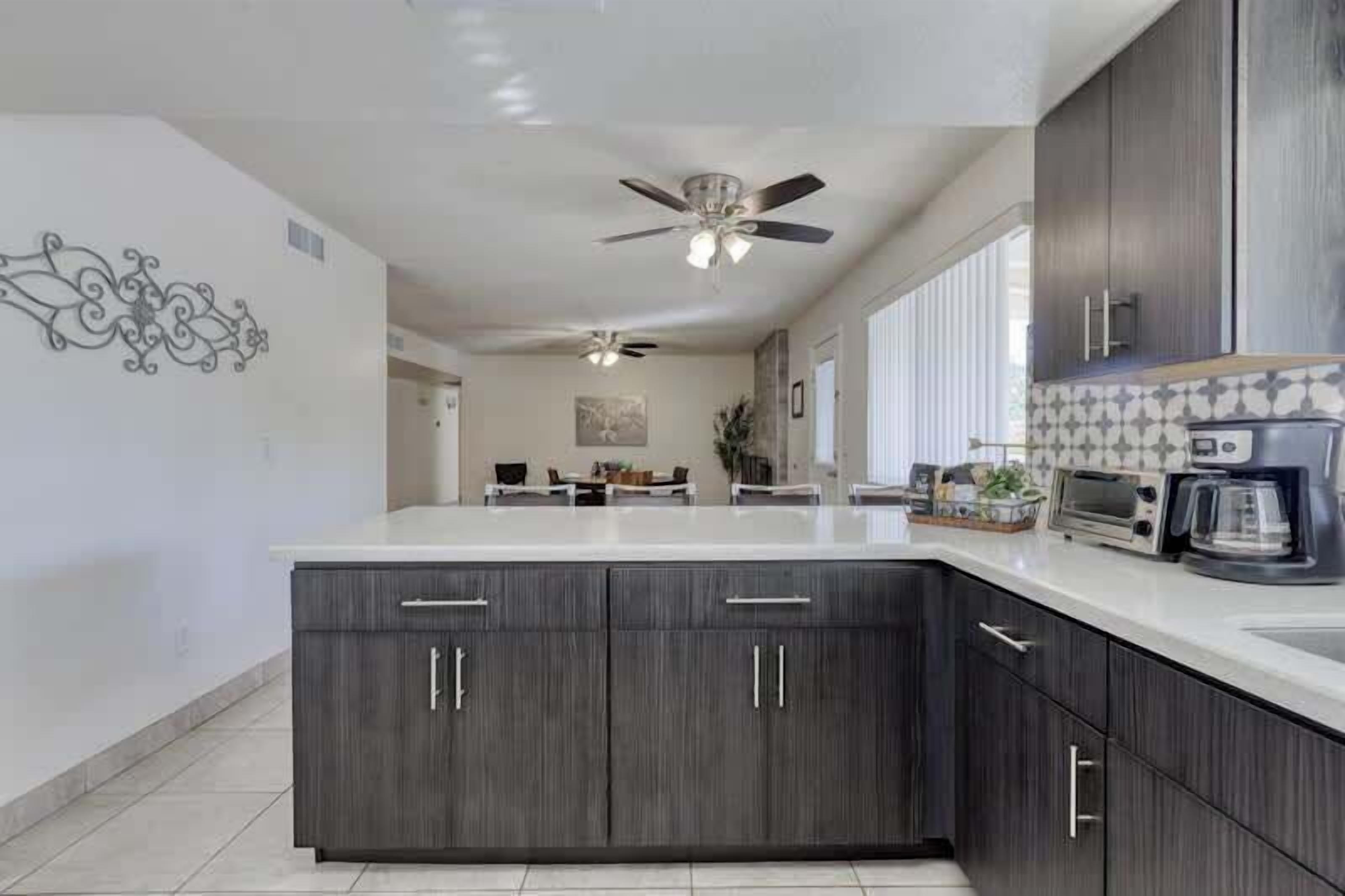 Full-size fridge, coffee/tea maker, highchair, toaster oven