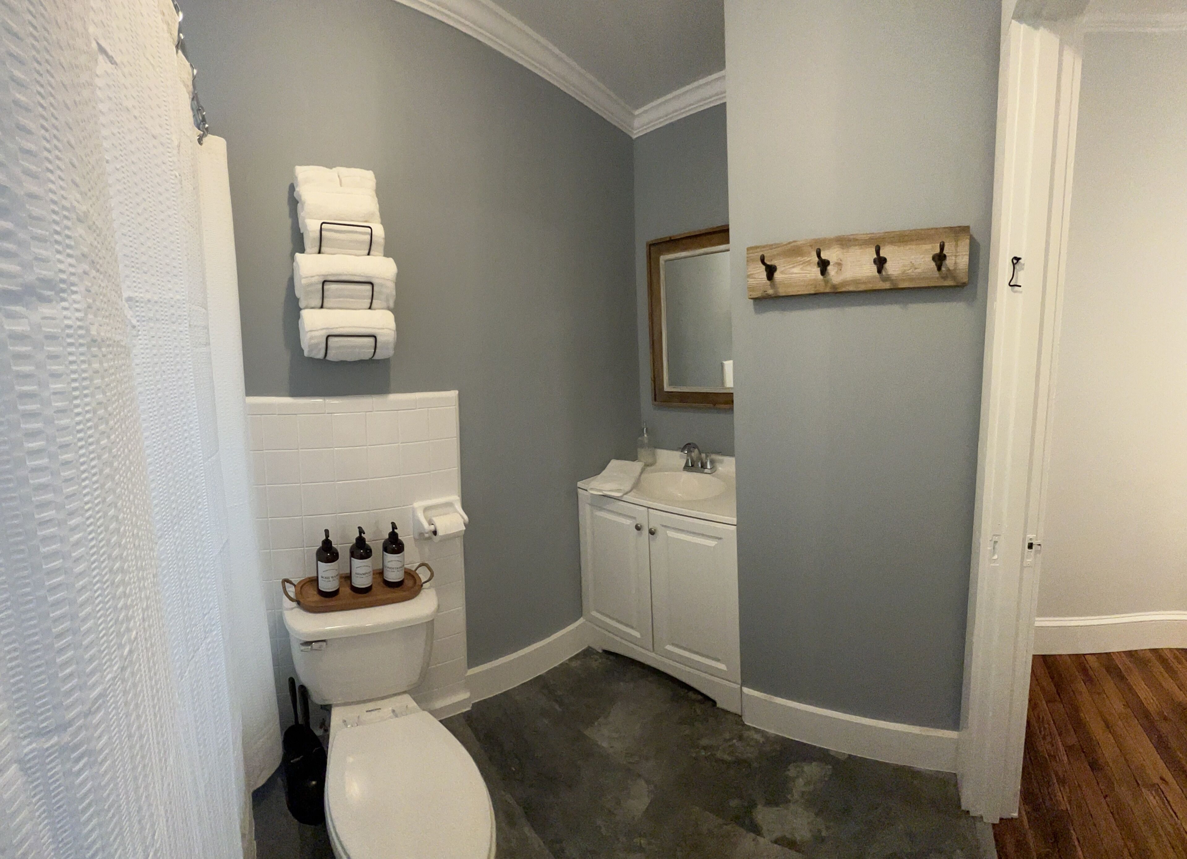 Combined shower/tub, hair dryer, towels, soap