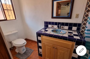 Shower, towels, soap, toilet paper