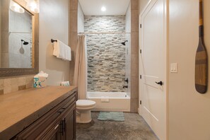 Shower, jetted bath, hair dryer, towels
