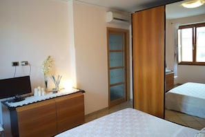 2 habitaciones, tabla de planchar con plancha, wifi y ropa de cama