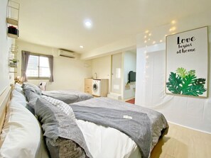 Comfort Quadruple Room, 2 Double Beds, Ensuite, City View | Laptop workspace, blackout drapes, free WiFi - HolaYoyo (Tainan)