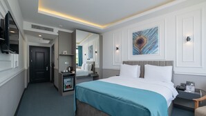 Ropa de cama de alta calidad y minibar 