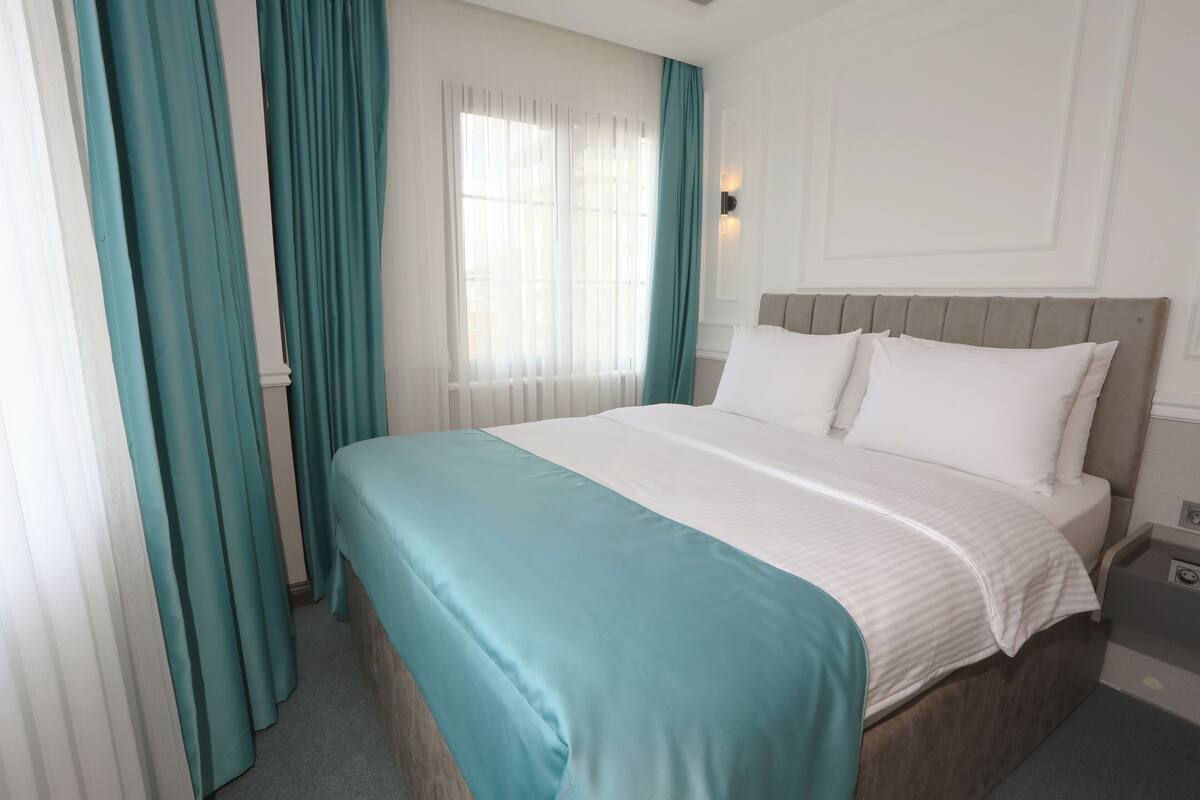Family Quadruple Room | Premium bedding, minibar, in-room safe, desk