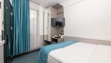 Ropa de cama de alta calidad y minibar