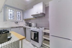 Leilighet | Eget kjøkken | Espressomaskin, kaffetrakter/tekoker, papirhåndklær og spisebord