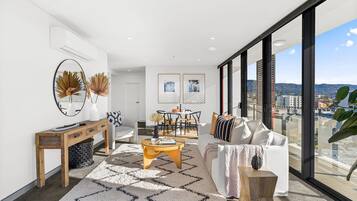 Panoramic Apartment, 2 Bedrooms, 2 Bathrooms, Ocean View | Living area | 65-inch LED TV with digital channels, TV, Netflix