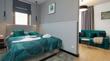 1 slaapkamer, een strijkplank/strijkijzer, wifi, beddengoed