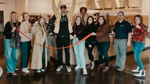 A group of people in a modern kitchen with stainless steel appliances and wooden accents. - Summit Lofts, Mt Shasta, View of Lava Dome Volcano #208 (Mt Shasta)