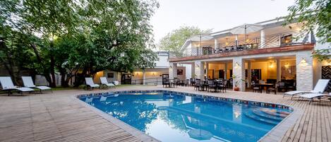 Outdoor pool, pool umbrellas, pool loungers