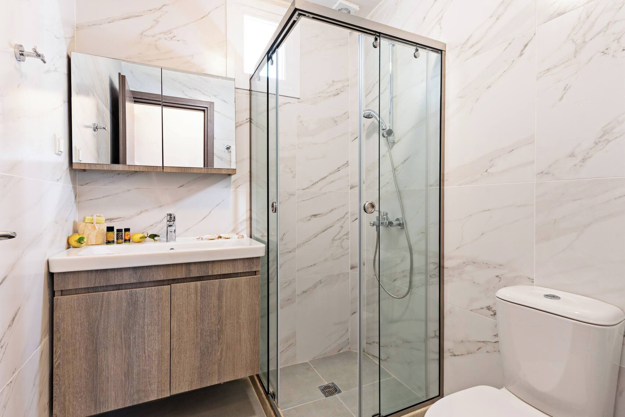 Shower, hair dryer, towels, soap