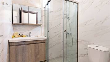 Shower, hair dryer, towels, soap
