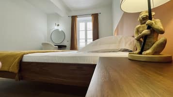 1 habitación, tabla de planchar con plancha, wifi gratis y ropa de cama