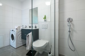 Shower, hair dryer, soap, shampoo