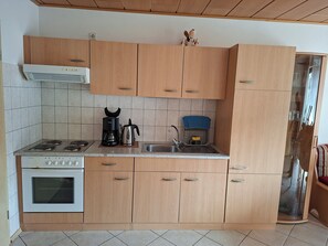 Fridge, microwave, stovetop, coffee/tea maker