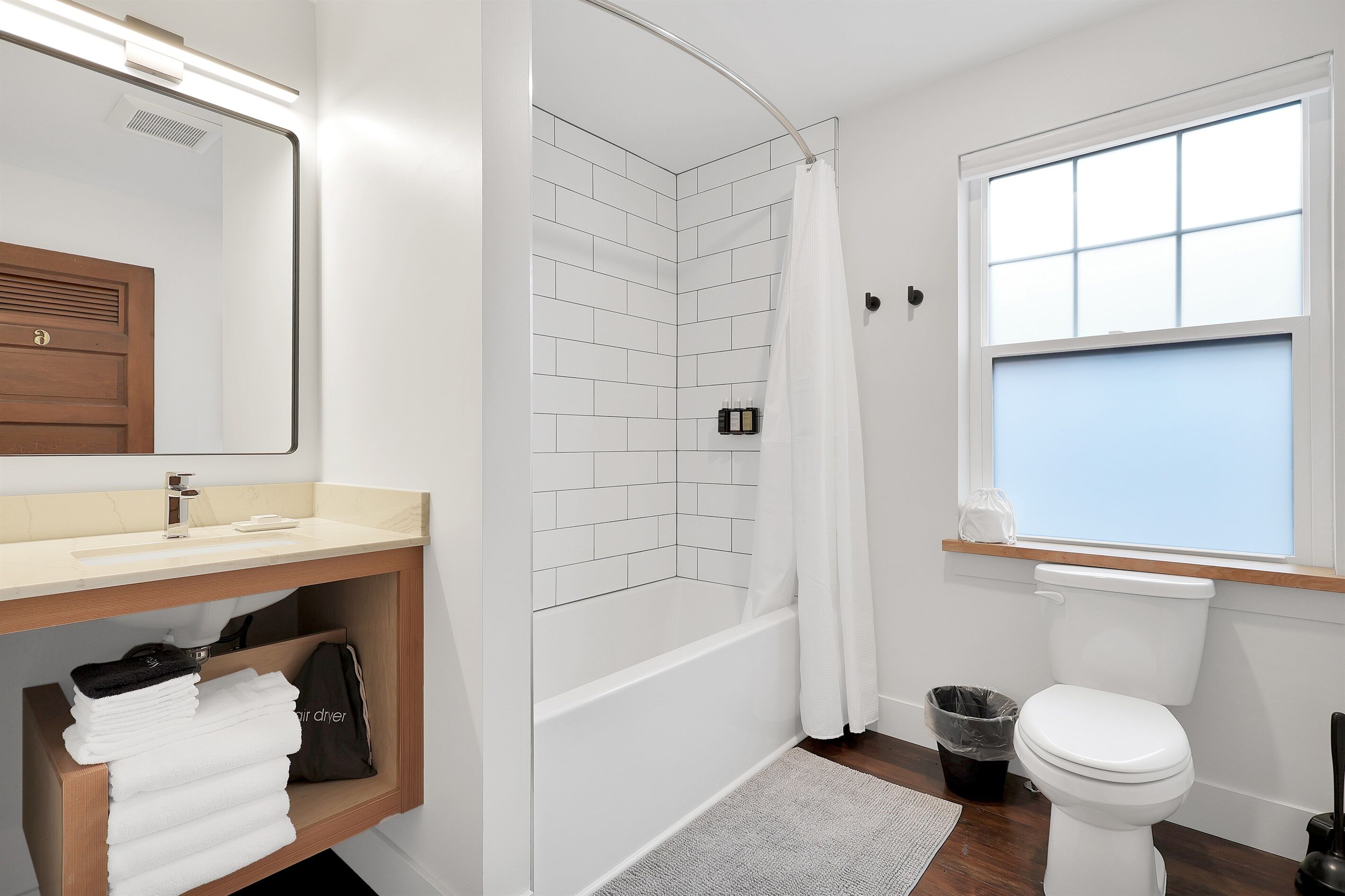 Shower, hair dryer, towels, shampoo