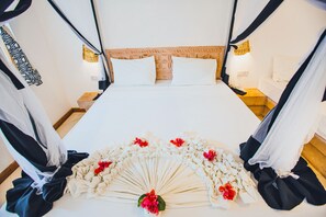 Classic Room, 1 Bedroom, Partial Ocean View, Beachside | Minibar, in-room safe, desk, free WiFi - AHG Sun Bay Mlilile Beach Hotel (Matemwe)