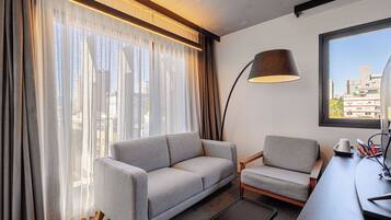 Family Room, Multiple Beds | Minibar, in-room safe, individually decorated, desk