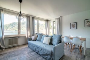 Superior Apartment | Living area | Flat-screen TV