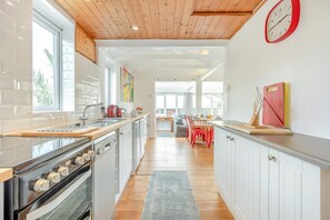 Microwave, toaster, high chair, cookware/dishes/utensils