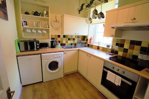 Microwave, oven, cookware/dishes/utensils