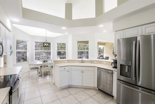 House, Multiple Beds (Sunny waterfront home near beach, sho) | Private kitchen