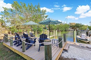 House, Multiple Beds (Goodland pet-friendly home with dock ) | Outdoor dining