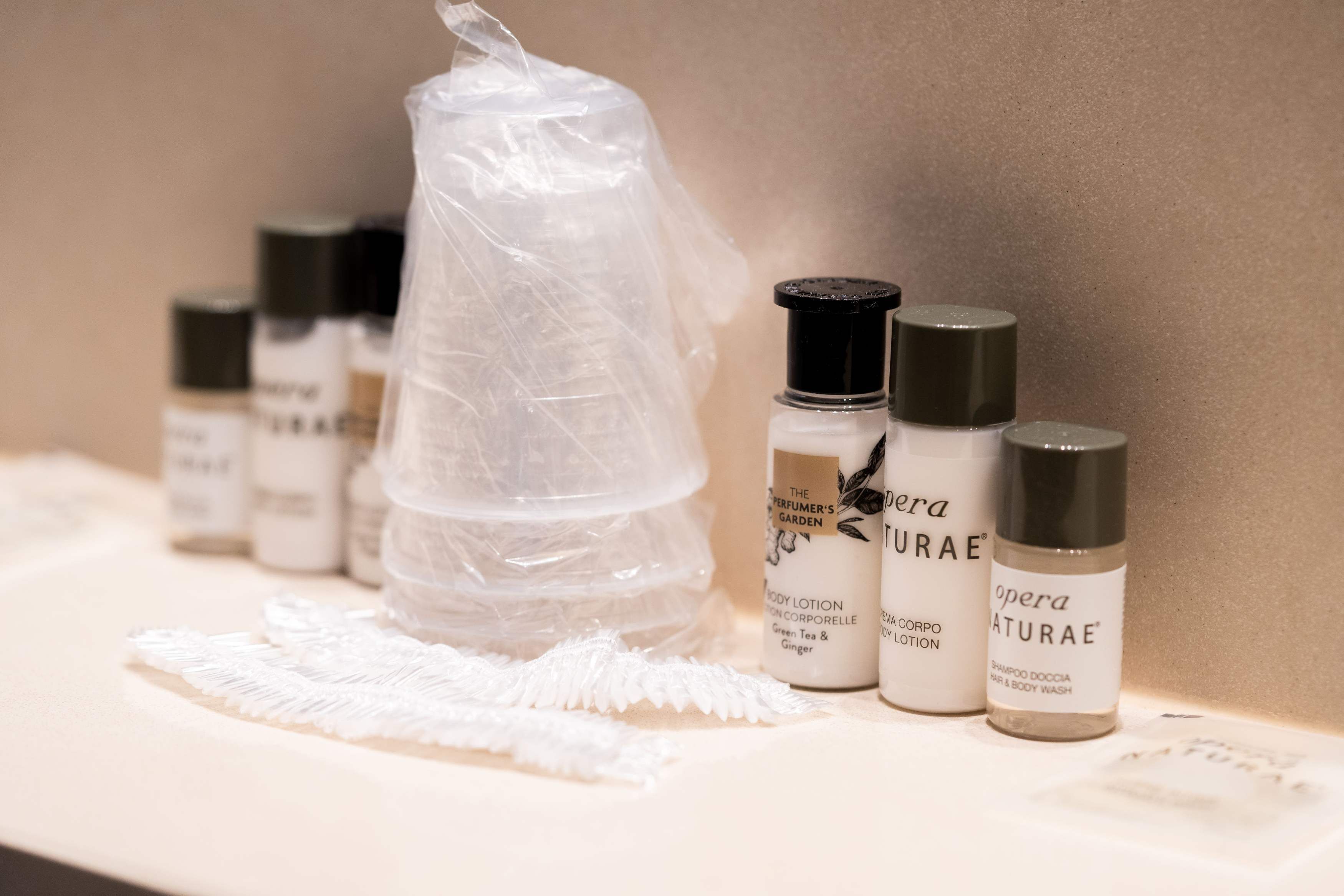 A display of body care products including lotions and shampoos.