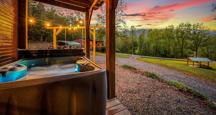 The Ritz Carlton of Tiny Cabins w/ Hot Tub / Fire Pit table