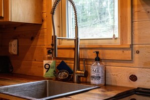 Unclassified image, 5 of 31, button - The Ritz Carlton of Tiny Cabins w/ Hot Tub / Fire Pit table (Hayesville)