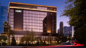 A modern hotel with a prominent 'NOBU' sign, featuring a glass facade and a structured, rectangular design. - Nobu Hotel Atlanta (Atlanta)