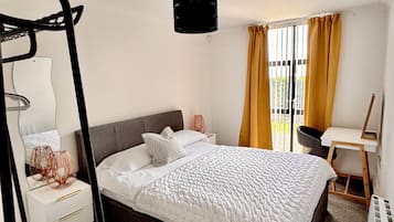 2 bedrooms, desk, iron/ironing board, travel cot