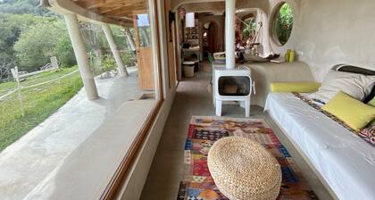Magical and romantic award-winning Hobbit house to slow down, recharge and dream