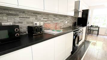 Apartment, 1 Queen Bed | Private kitchen | Fridge, microwave, oven, stovetop