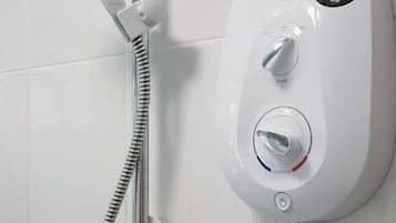 Combined shower/bathtub