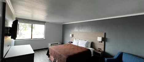 Room, 1 King Bed, Non Smoking | Iron/ironing board, free WiFi, bed sheets