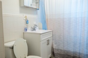 Combined shower/tub