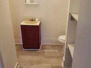 Combined shower/tub