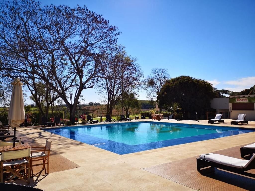 Outdoor pool, pool umbrellas, sun loungers