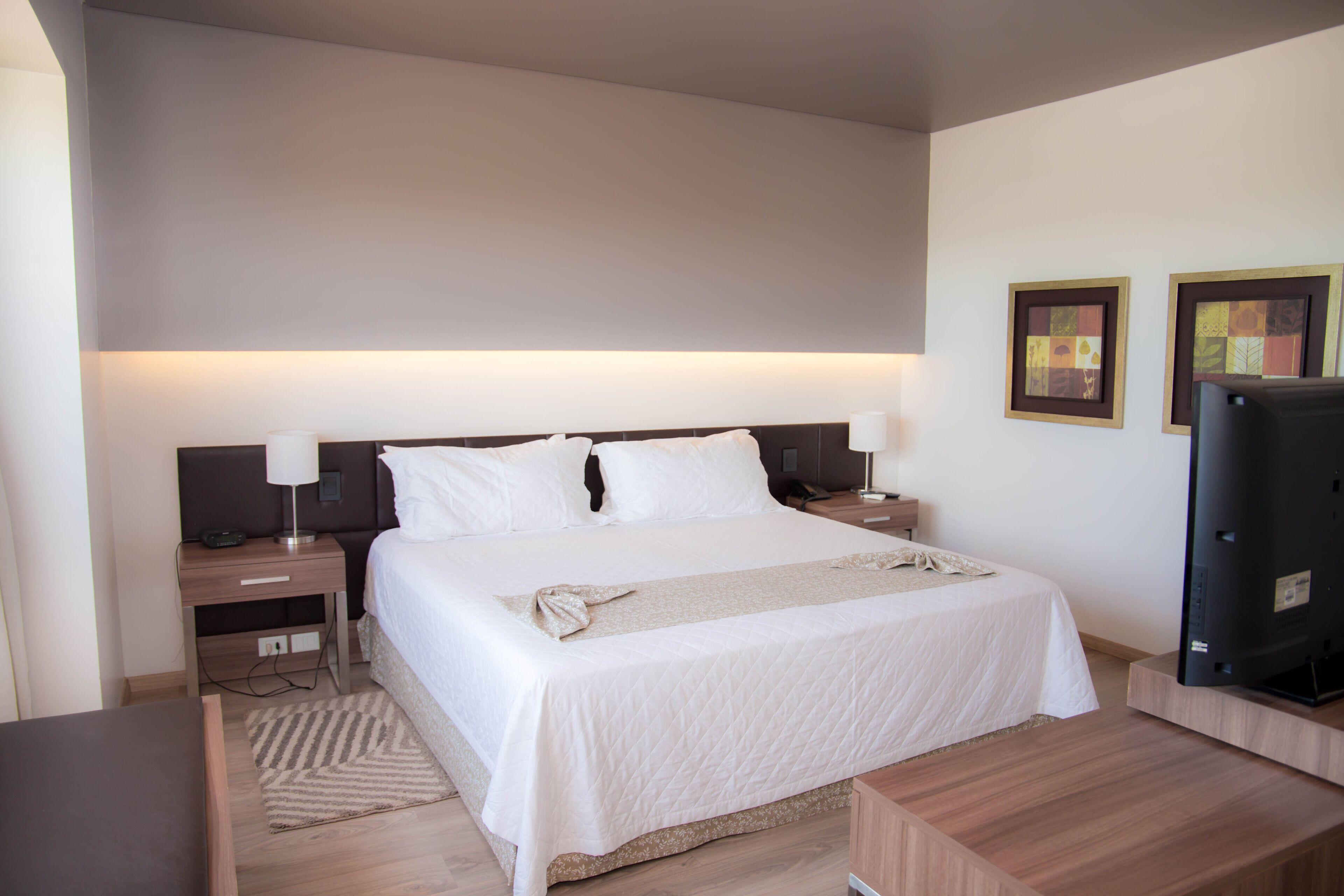 Superior Room | Minibar, in-room safe, individually decorated, individually furnished