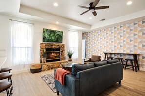 House, Multiple Beds, Hot Tub, Mountain View | Living area | 42-inch TV with digital channels, fireplace - Golden Serenity (Joshua Tree)