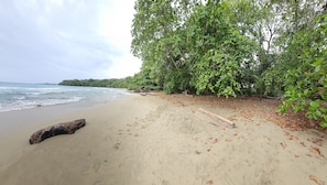 On the beach, sun loungers, beach towels