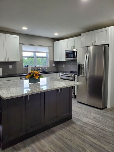 Spacious 3-bedroom home, off I-64 & 35, sleeps 11