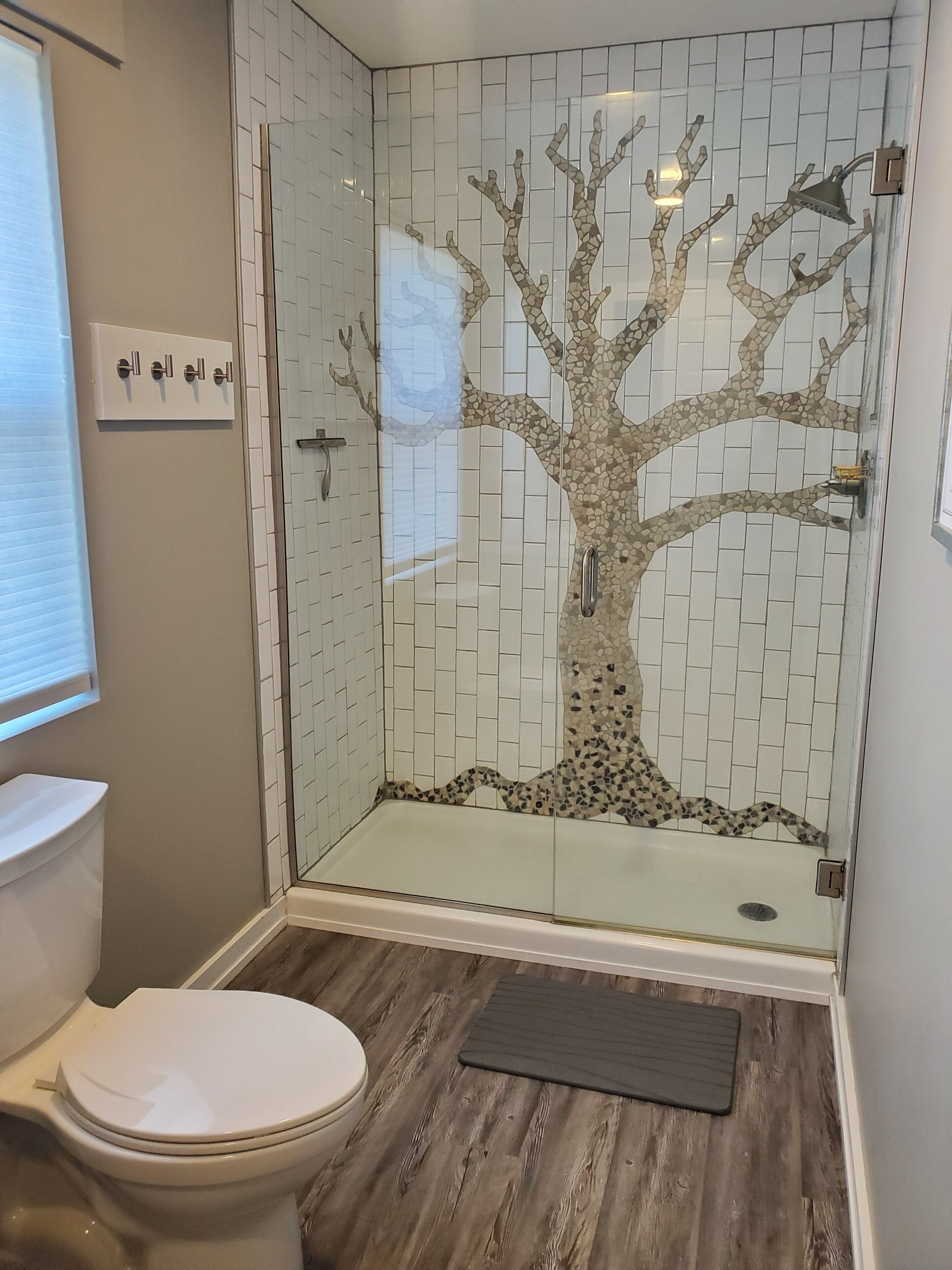 Combined shower/tub, hair dryer, towels, toilet paper