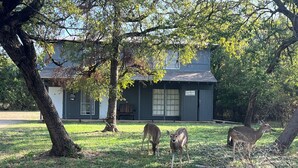 A building with a sign reading "WALK IN STUDY" in front of a grassy area with trees. - The CountryLake - First Floor for 7 Guest  (Belton)