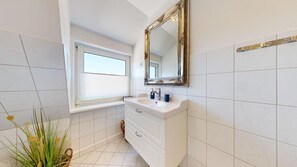 Douche, sèche-cheveux