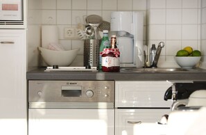 Fridge, microwave, dishwasher, coffee/tea maker