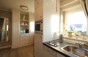 Refrigerador, microondas, parrilla de estufa y lavavajillas 